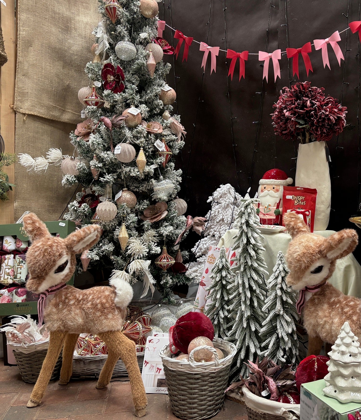 Decorative Christmas scene with a tree, ornaments, and festive decorations homeware at sturmer garden centre